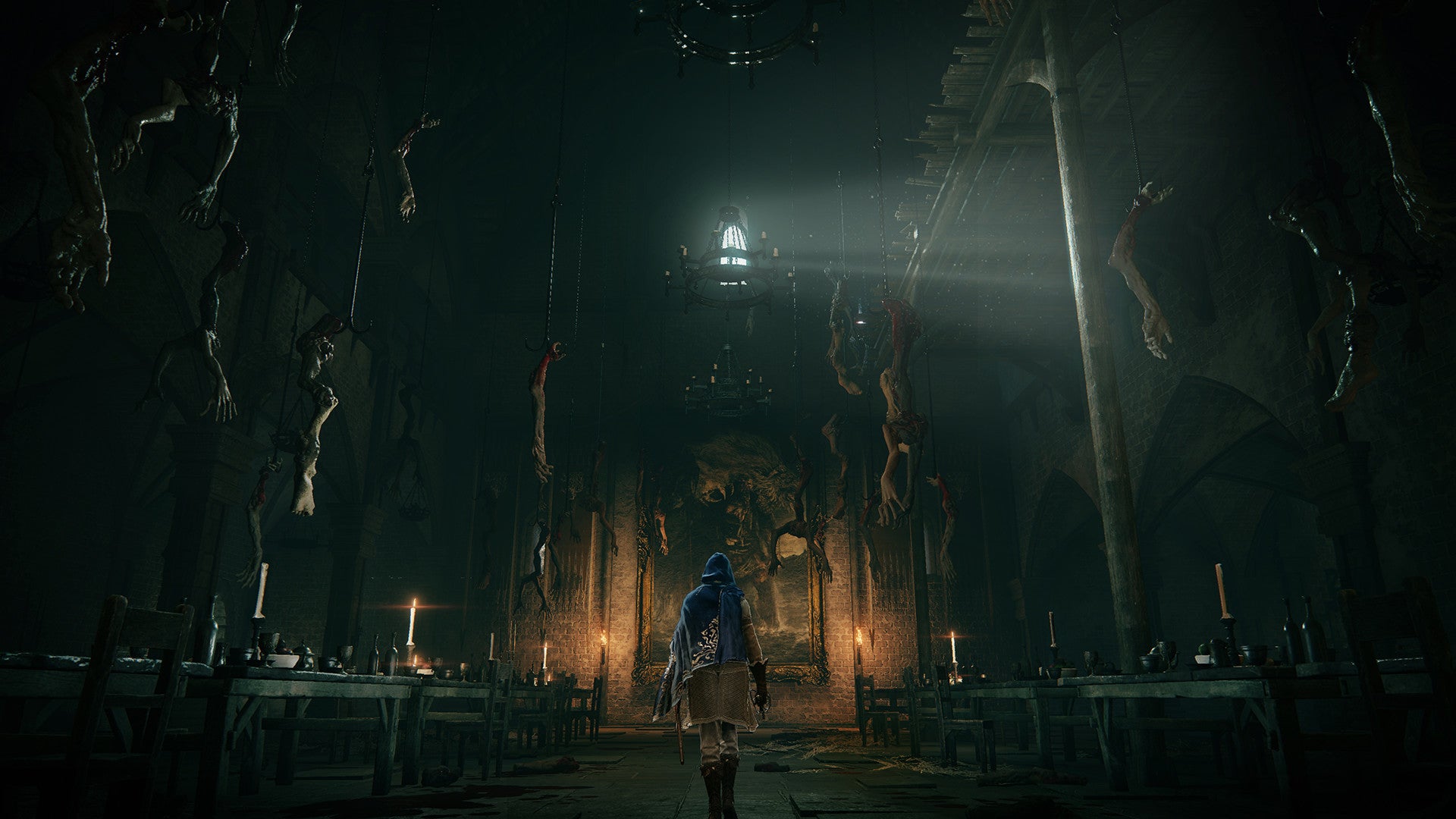 A player character walks through a church-like building with limbs hanging from the rafters in Elden Ring