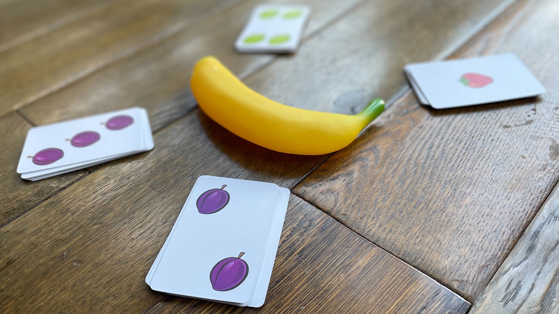 Image for A squeaky banana and a deck of cards are all you need for a ridiculous, raucous time in party game Fruit Punch