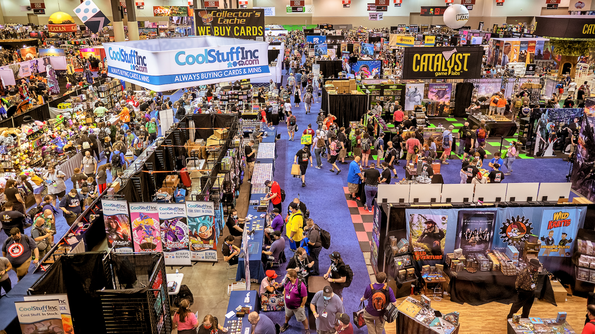 Attendees on the show floor of tabletop convention Gen Con Indy 2022