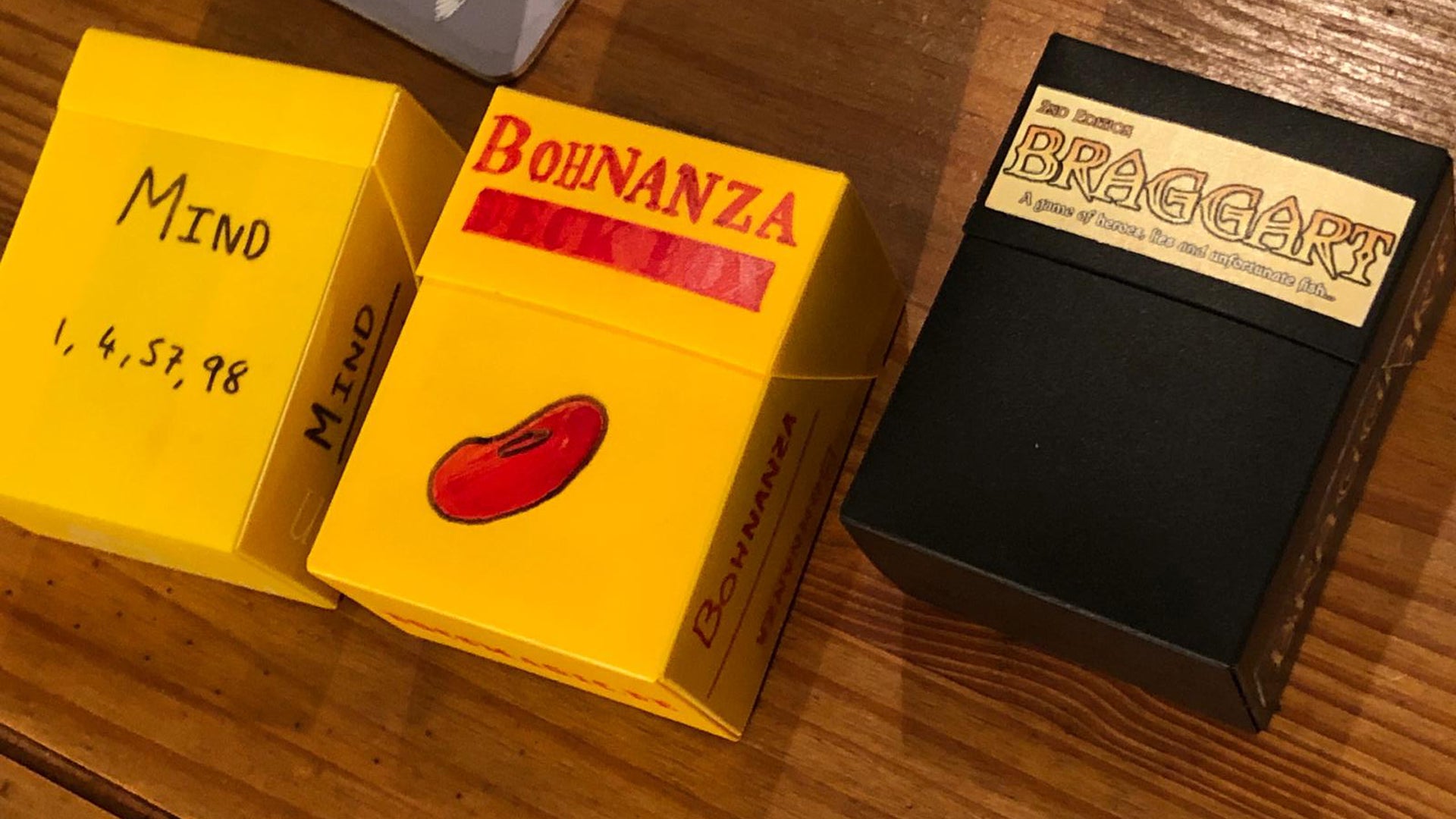 Board games in deck boxes