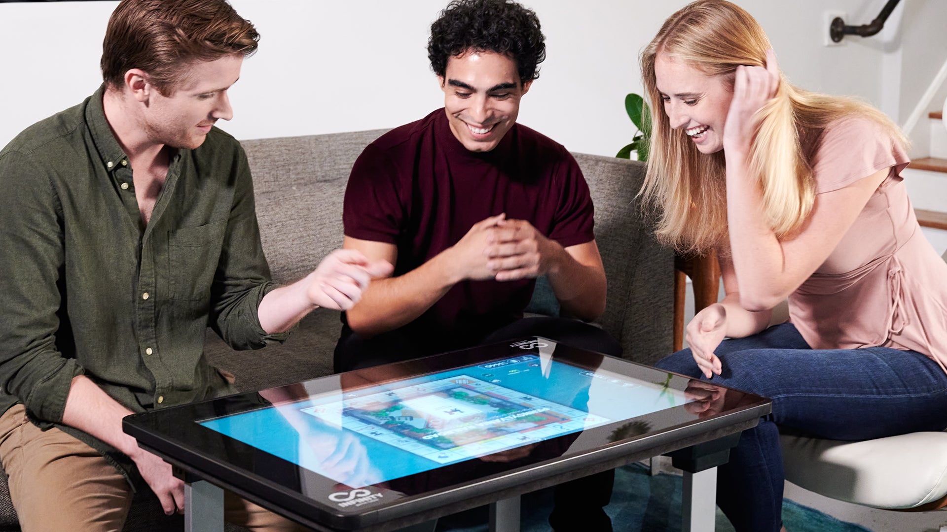 high tech game table infinity includes digital versions of monopoly pandemic ticket to ride and other classics dicebreaker