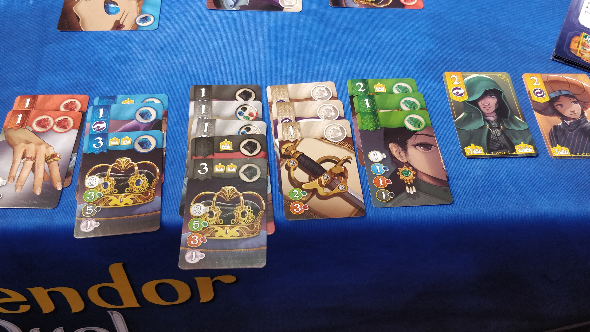 An image of some cards for Splendor Duel